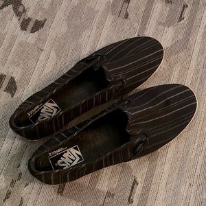Vans slip on sneakers. Black canvas, size 9.5 women’s, size 8 men’s